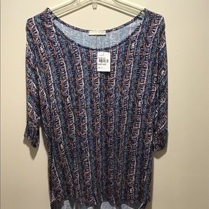 Half sleeve pattern lush top with tags. Size small